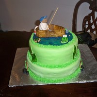 Fisherman Retirement This cake was made for a coworker that was retiring. he happens to love fishing. It was made with mmf and gumpaste characters.