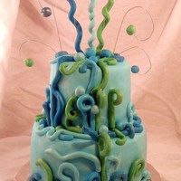 Watercolors Cake Client wanted an "artsy" design with a watercolor feel .