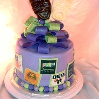 Broadway Birthday My daughter's cake. Fondant with edible images for the musical posters.Bow is gumpaste with the tragedy.comedy masks made from molded...