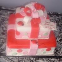 Valentine's Themed 40Th Birthday 40th birthday gift box style cake for a Valentine's weekend party. All fondant, except bow which is gumpaste.