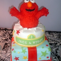 Elmo Birthday Inspired by several amazing elmo themed cakes on this site. Done for 2 boys (cousins) celebrating a 1st birthday together. Elmo is made of...