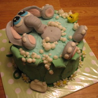 Baby Elephant In Bath cake I made for a baby shower. Fondant decorations (including elephant) french vanilla cake. thanks for looking!!!!
