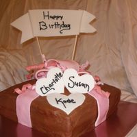 Chrome Cake Double layer french vanilla with bavarian cream center. Chocolate butter cream with fondant bows. My 2nd foray into fondant - 2 days after...