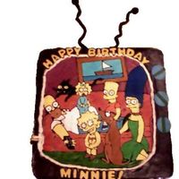 The Simspons... The Simpons I did from color flow and my friend taylor then turned the cake into a tv...it was a fun cake