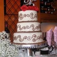 Anniversary Cake Fondant covered italian cream cake. Buttercream piping. Fondant/gum paste roses