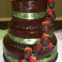 Chocolate Ganache With Strawberries chocolate ganache covered cake with chocolate dipped strawberry cascade