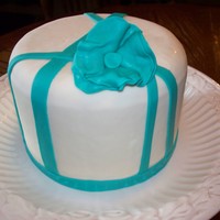 White Cake With Teal Accents. Simple design yet beautiful in it's simplicity