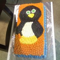 1025081851.jpg 1/2 Chocolate 1/2 Vanilla Bday made for a friend of a friends husband.. Free handed the penguin onto the cake!