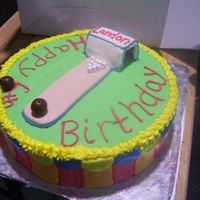 Bowling.jpg Marble Cake with cream cheese icing! Bowling balls are whoppers =] and Bowling pins are tic tacs. who knew?!