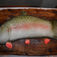 Rainbow Trout Cake This is Red Velvet cake, with buttercream and fondant, the fish is airbrushed