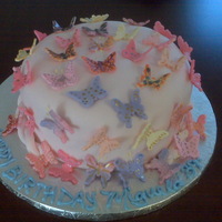 Butterfly Kisses 8" Dominican Cake, dominican icing, covered with fondant,,everything edible..tfl!! Cust very happy ;)