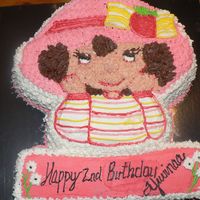 Strawberry Shortcake Strawberry Shortcake birthday cake made with Wilton pan. Boring but effective. I need practice with my writing.