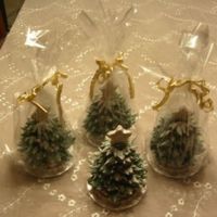 Christmas Trees here are some christmas trees I made for my collegues. First I make a base of two round cookies and make a snail trail with royal icing...