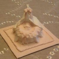Babys Crib For A Christening all gumpaste except for a wire to hold the "roof"