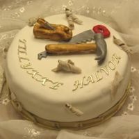 For A Carpenters Birthday fondant covered cake with gumpaste tools