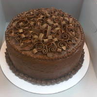 Chocolate Cake W/ Chocolate Curls I made this for my boyfriend's sister. She made it into the nursing program at Alabama and is headed back to start today. She loves...
