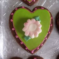 Green Heart Cookie inspiration from Peggy Porschen--chocolate rolled cookie with royal icing, Toba's glace, white chocolate fondant and sparkle dust.
