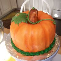 Pumpkin Cake This is my 2nd pumpkin cake. Top layer is white cake colored orange, bottom layer is chocolate covered in butter cream, then MFF. :) This...