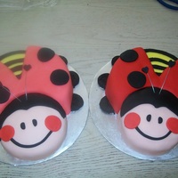Twin Ladybugs I made these two ladybugs for my friends twin girls when they turned two. They are covered in fondant.