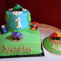 Tonka 1St B-Day All b/c with storebought tonka trucks. Smash cake was 1/2 of the ball pan iced with b/c with graham craker crumbs.