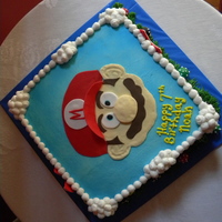 Mario All buttercream with fondant accents. Birthday boy told me it was a "cool" cake! That makes all the hard work worth it.