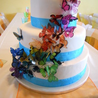 Butterfly Wedding Cake Bride requested a cake inspired by the Martha Stewart Butterfly cake. Bride purchased the butterflies online from www.butterfly-bizaar.com...