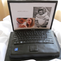 Laptop This is a 1/4 sheet cake covered in black fondant. I used foam board for the screen and covered it in fondant and attached a photo of the...