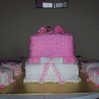 Baby Shower W/ Blocks 8' and a 10' 2 layer cake yellow w/ buttercream icing handmade buttercream roses baby blocks are covered with fondant