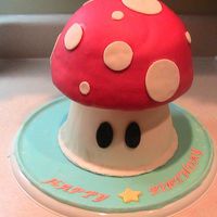 Img_0382.jpg Boys birthday. Mario Brother's one up mushroom cake.. This turned out better than expected. The boy and his mom were pleased.