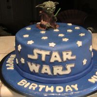 Img_0438.jpg Star wars cake for boy. Got idea from photostream. Yoda was made from gumpaste and took me a long time to sculpt.