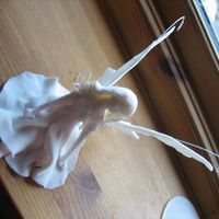 Fairy Made Of Sugarpaste (Pettinice) With some wire in the middle for support, same with the wings...
