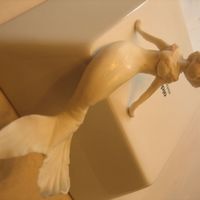 Mermaid Made Of Sugarpaste with supporting wire in the middle,,,