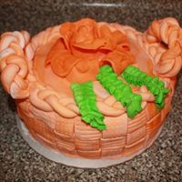 Orange Fondant Basket My second fondant cake. I'm not in fondant class yet, but videos taught me this. Hope it came out OK