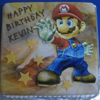 Super Mario Birthday Cake Entirely handpainted Mario on gumpaste. Took me approx. 5 hours to paint it. I'm quite happy with the result.