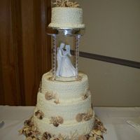 Ocean Wedding This cake was all pound cake with buttercream frosting & chocolate seashells. Therealso little lights in each of the pillars to make...