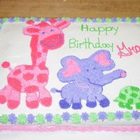 Zoo Animals Birthday Freehand design copied from party invitation. Buttercream.