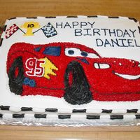 Lightning Mcqueen Sheet cake bottom w/ novelty pan top, buttercream.