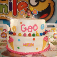 Dora The Explorer Chocolate cake, filled with philadelphia creme, strawberry and almonds, philadelphia frosting. Dora the explorer-candies theme.