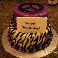 Zebra And Peace This cake was created by my daugther she drew it and I made for her 13th Birthday. The cake was chocolate with a rasberry filling and...