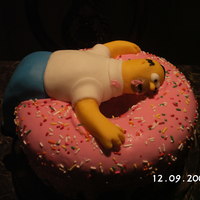 Homer Dream This was a cake for my son birthday who loves to watch the show. I made homer out of fondant that was realy hard.