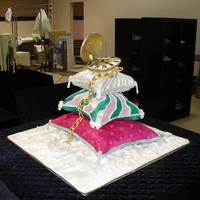 Pocket Watch On Pillow Stacks 3 stacked hand carved pillow cakes, brushed witha various luster dusts and impressed. The pocket watch had a real moving clock mechanism...