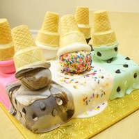 Melting Ice Cream Cones Ice cream cones atop mounds of cake covered in fondant. The melting and dripping "ice cream" is fondant. I have cute pictures of...