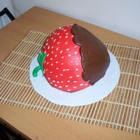 Chocolate Covered Strawberry ! Wondermold carved to strawberry, red BC, fondant leaves & stem, chocolate BC warmed and piped over. Would have covered choc with...