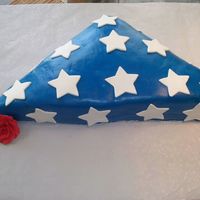 Folded Flag W/ Roses RBC flag with fondant stars and GP red roses. Really just did for my DH, I was wanting to do RBC again. I wanted to see how big of a piece...