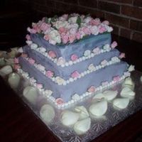 Aunt Margie's 80Th Birthday! A Devil's food cake filled and frosted with Sylvia Weinstock's recipe for buttercream frosting. The over 125 roses are made of...