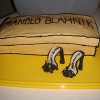 Manolo Blahnik Birthday Cake A triple layer chocolate cake with strawberry buttercream...like a strawberry dipped in chocolate. She always wanted a pair of Manolos. Now...