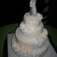 My First Wedding Cake Ivory Buttercream, Ivory Gumpaste Roses, White BC details and white gumpaste apple blossoms 16, 12, 8, 6