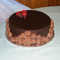 Dscf0635.jpg Red velvet cake with chocolate bc and chocolate fondant. Truffles on the side.