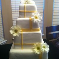 Practice Cake This is a wedding cake I am practicing and struggling with. I need sharp clean edges, any suggestions??