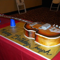 Joseph's Guitar Birthday cake for a 13 year old. Replica of Paul McCartney's Beatle Bass.